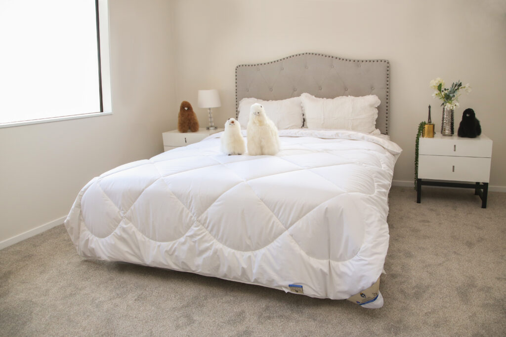 Close-up of premium alpaca bedding showing the soft fiber texture
